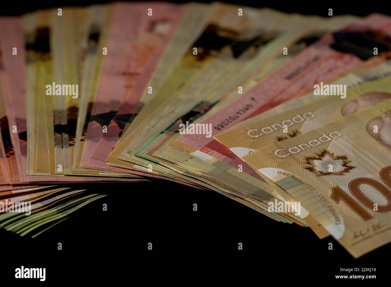 Money close up dolly shot colorful bills. Currency close up on table. Stock Photo