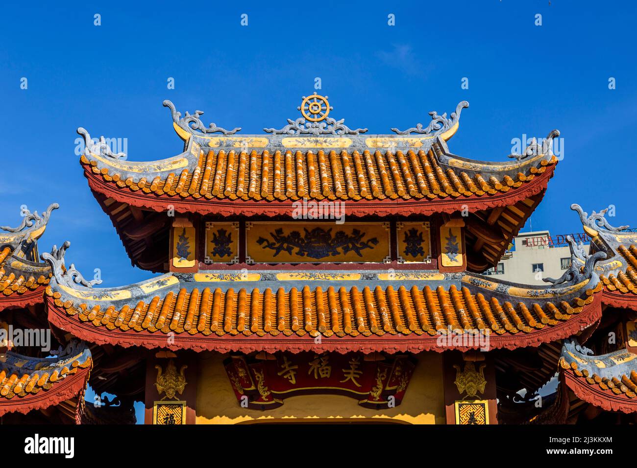 Top of a pagoda at a Buddhist Temple showing the design in the architecture  which is traditional Buddhism in Asian Stock Photo - Alamy