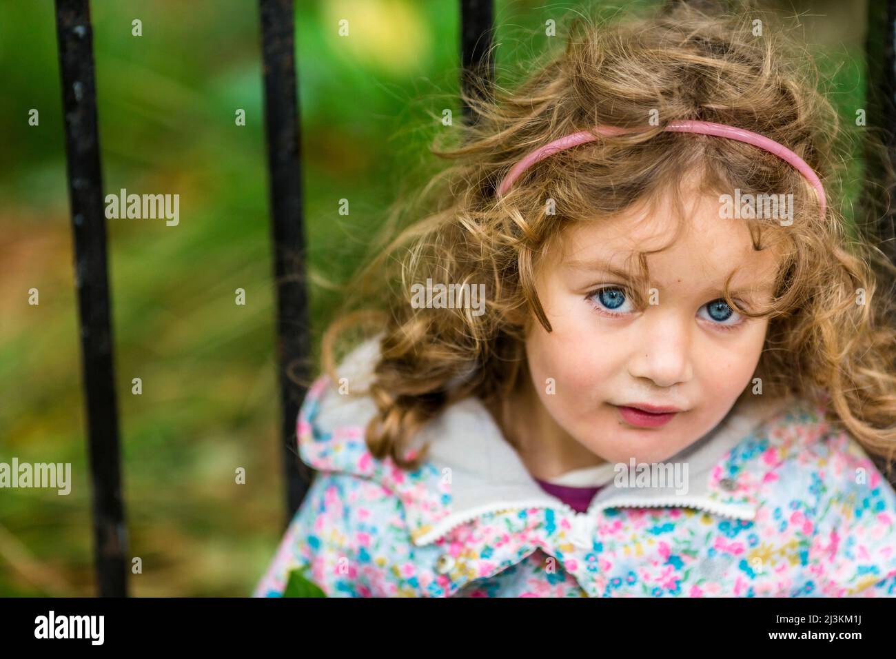 Curly blond hair hi-res stock photography and images - Alamy