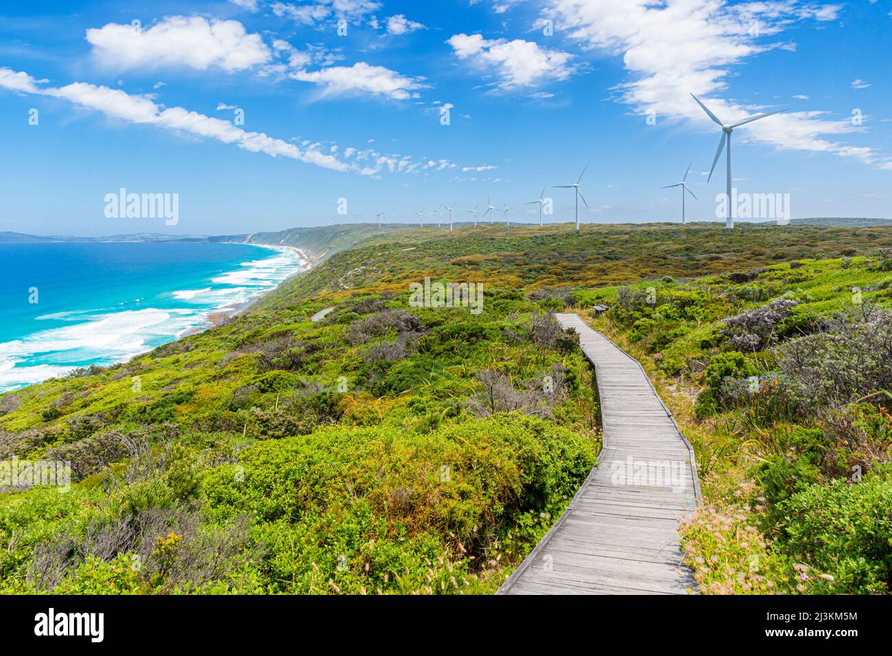 Cliff top wind farm walk, part of the Bibbulmun Track high above the sea, Albany, Western Australia, Australia Stock Photo