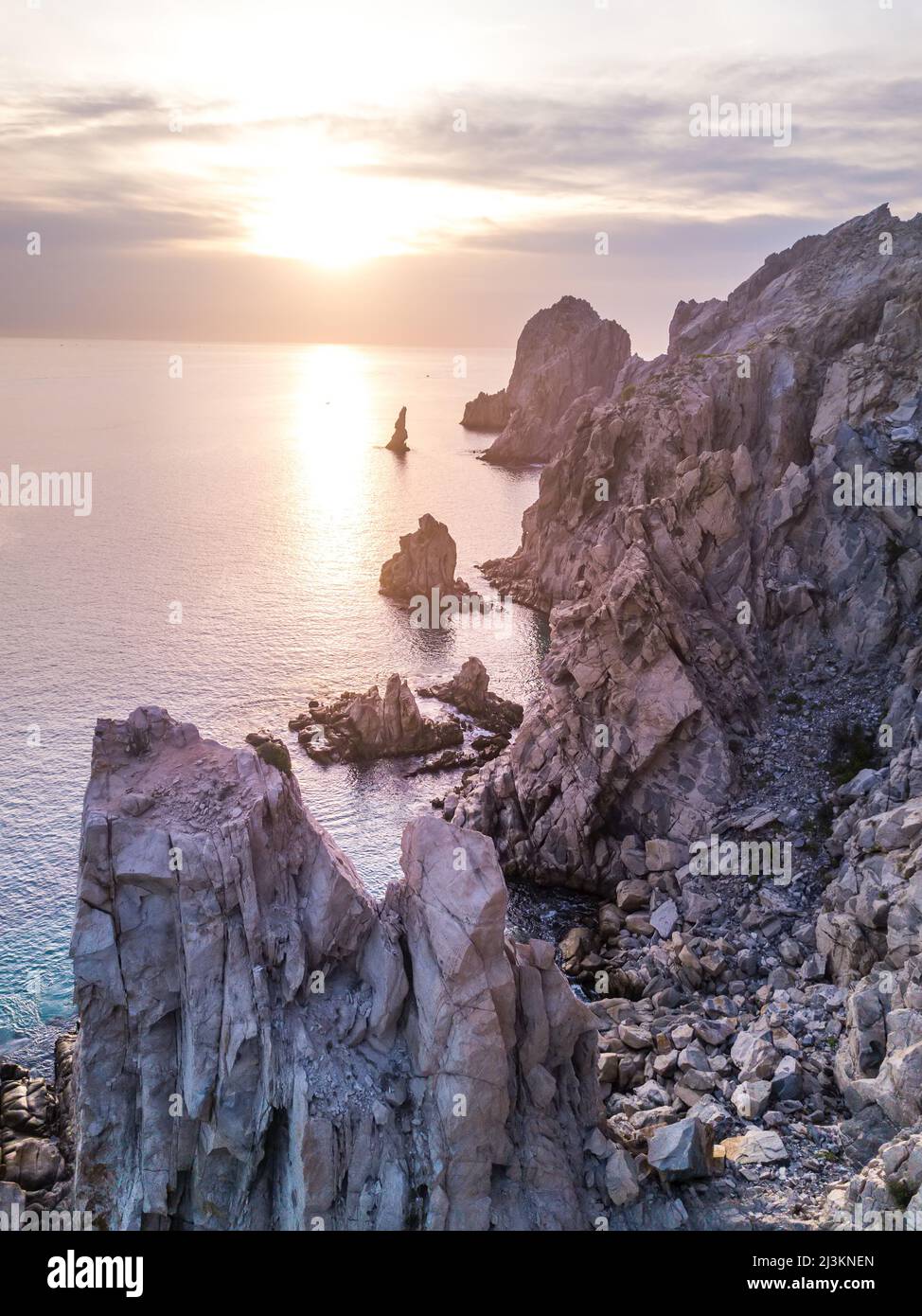 Dramatic rock formations on the coast of Lands End at sunset; Cabo San Lucas, Baja California Sur, Mexico Stock Photo
