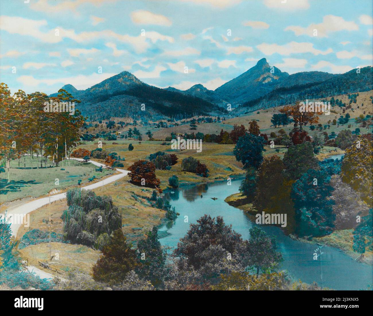 Hand coloured landscape photograph showing the Tweed Valley looking up