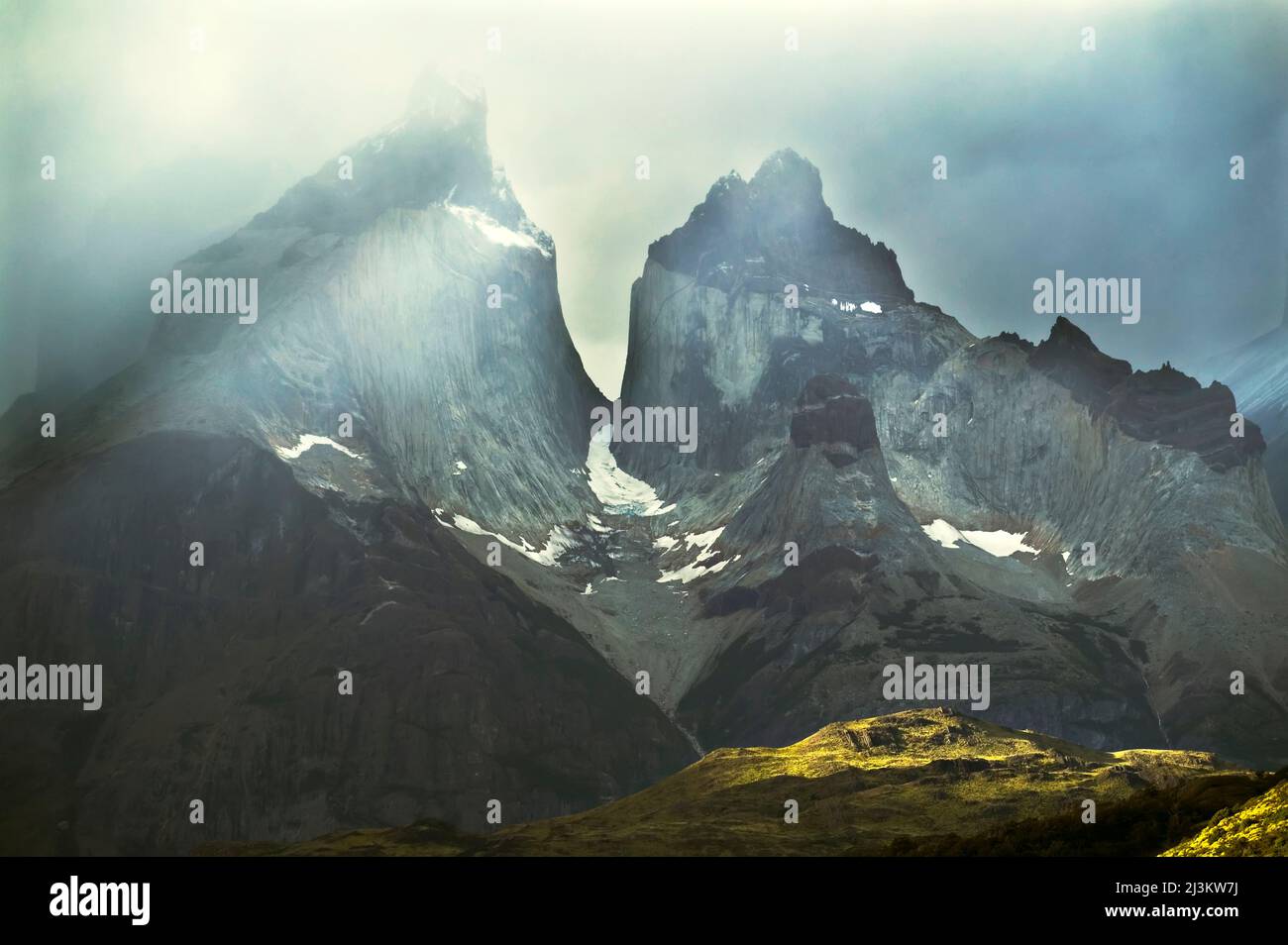 Stormy light on mountains in Torres del Paine, Patagonia, Chile.; Cuernos del Paine, Torres del Paine National Park, Patagonia, Chile. Stock Photo