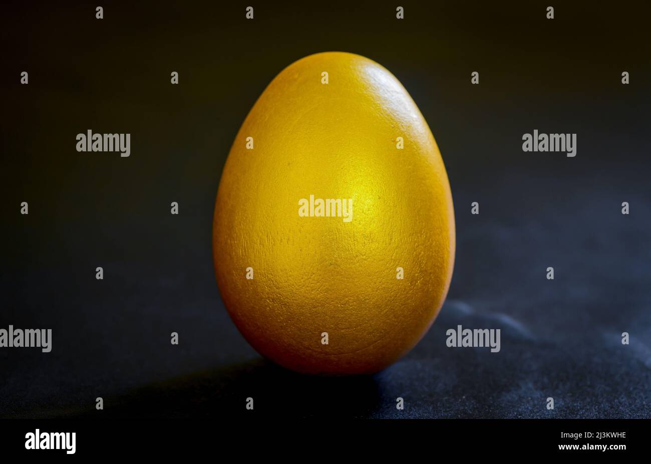 golden a easter egg on black background. Stock Photo