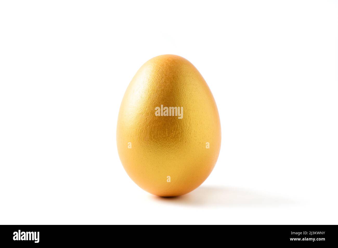 golden a easter egg isolated on white background. Stock Photo
