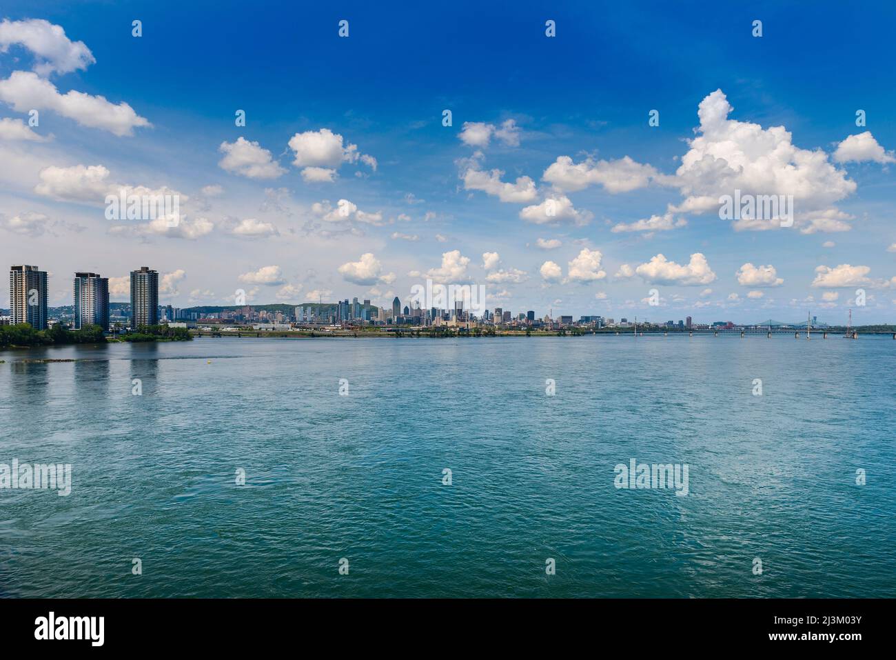 Montreal cityscape and St. Lawrence River viewed from Samuel De Champlain Bridge; Montreal, Quebec, Canada Stock Photo