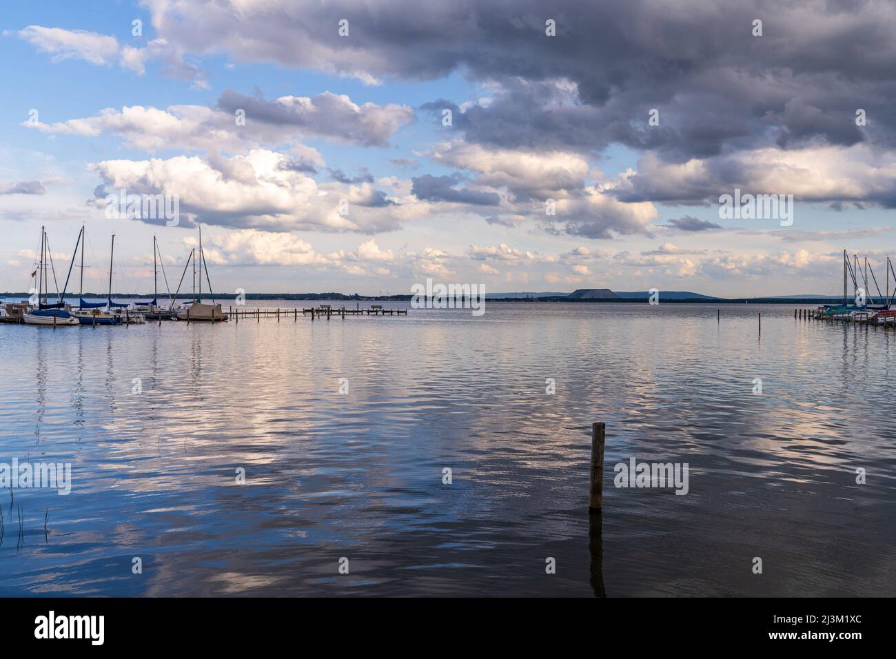 Mardorf, Lower Saxony, Germany - June 07, 2020: The Steinhuder Meer with the Marina and the spoil heap of the potash mine in the background Stock Photo