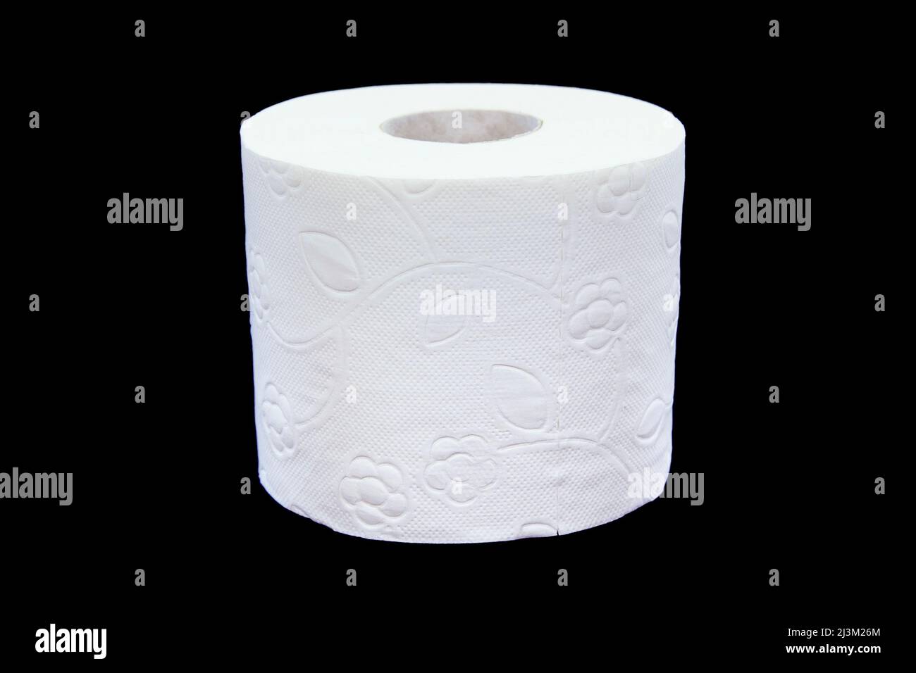 Toilet paper roll on a black background. Presentation of toilet paper roll, isolated on black background. Stock Photo