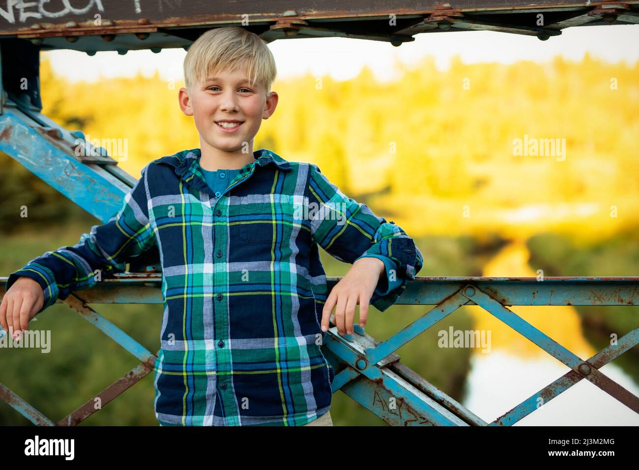 Preteen boy smiling camera hi-res stock photography and images - Alamy