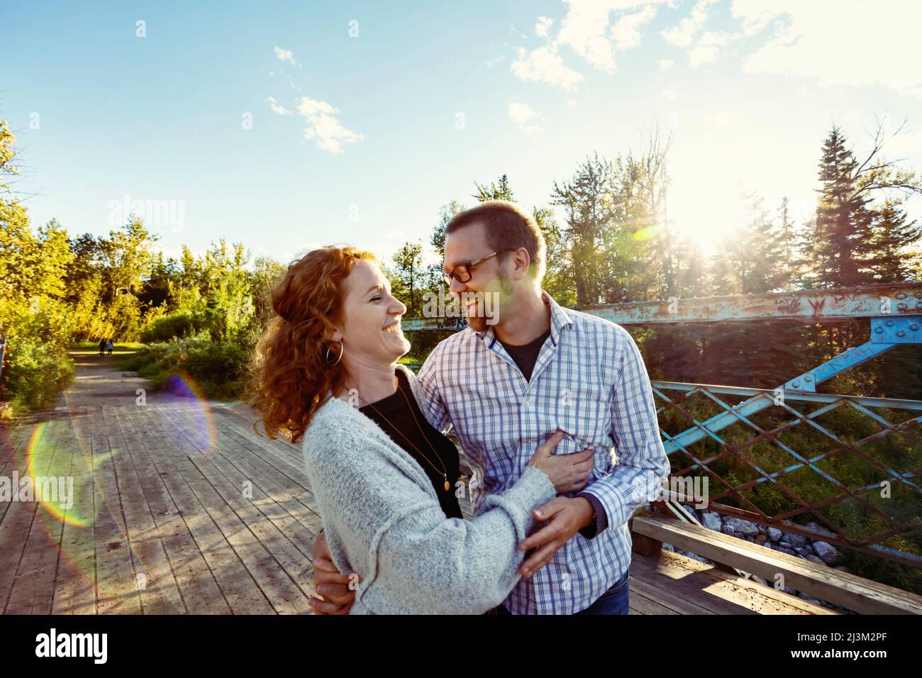 Mature married couple enjoying time together outdoors in a park in autumn; Edmonton, Alberta, Canada Stock Photo