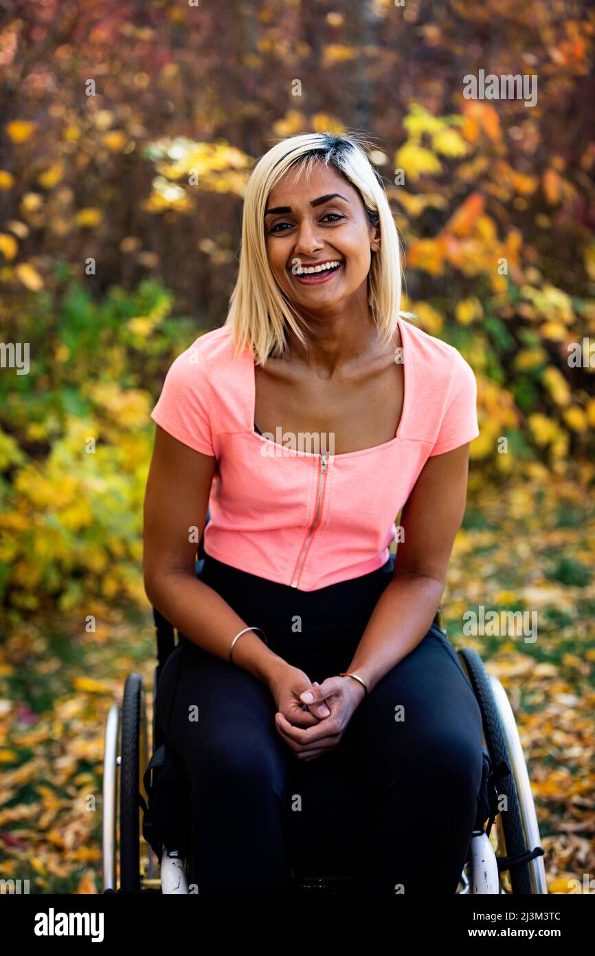 Head and shoulders portrait of a woman outdoors in autumn; Edmonton, Alberta, Canada Stock Photo