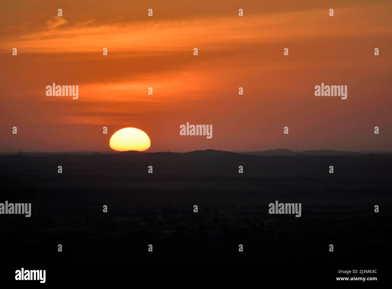 Sunrise at Karima from the summit of Jebel Barkal.; Karima, Sudan, Africa. Stock Photo