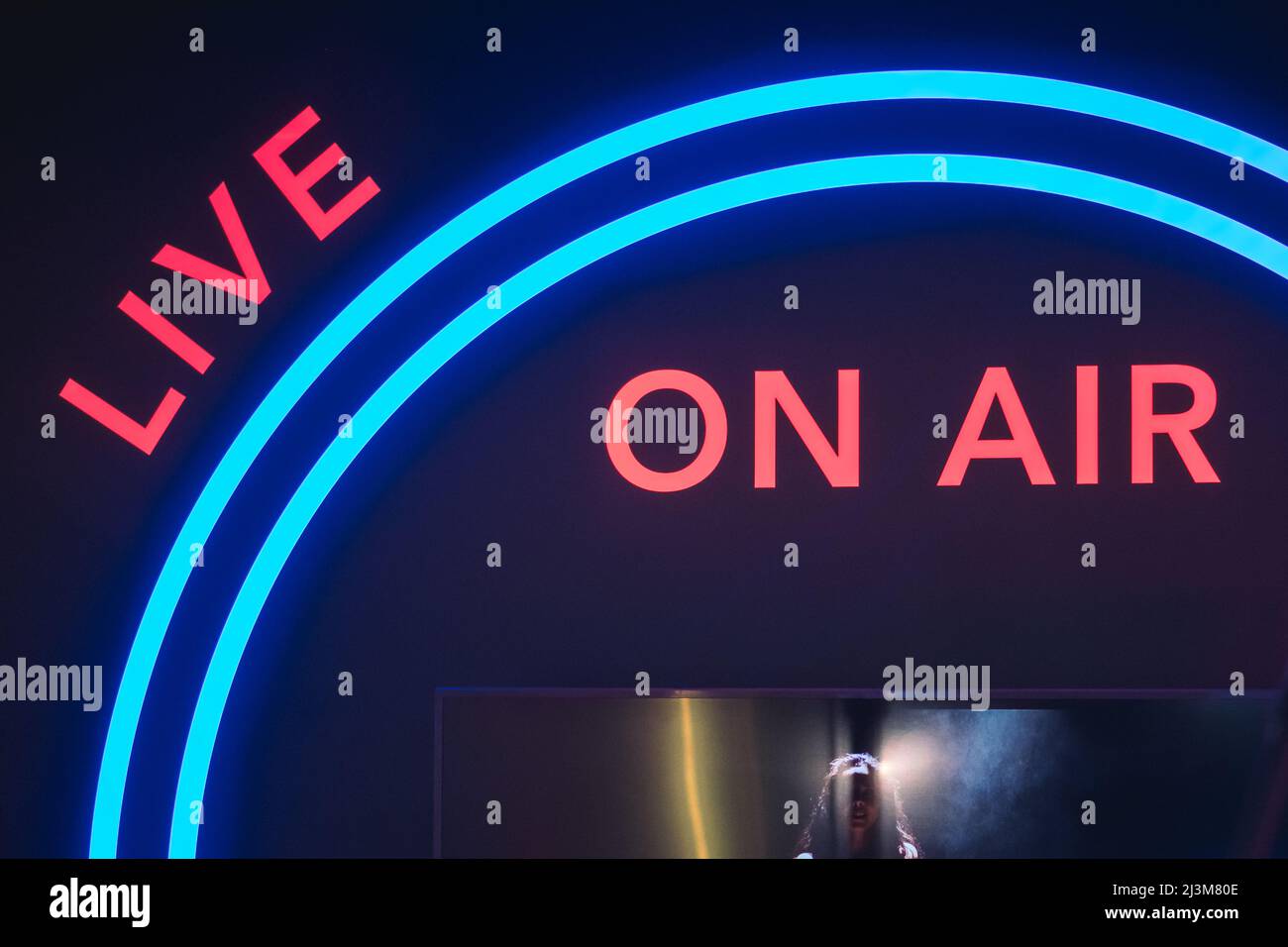 Symbol of live, on air, red and blue neon, night show, club Stock Photo