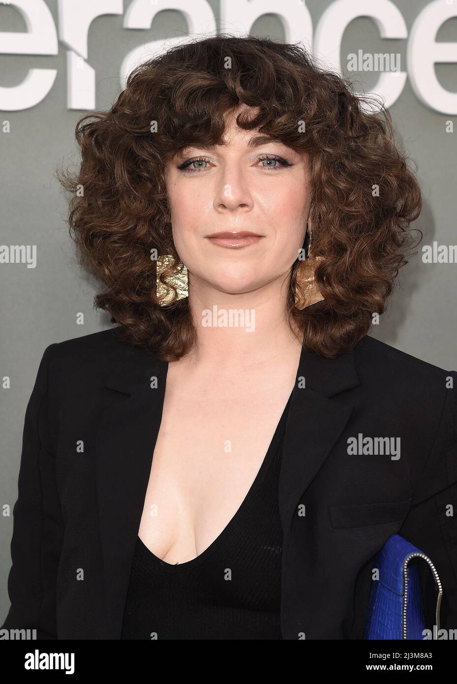 Jen Tullock walking on the red carpet at Apple Original Series