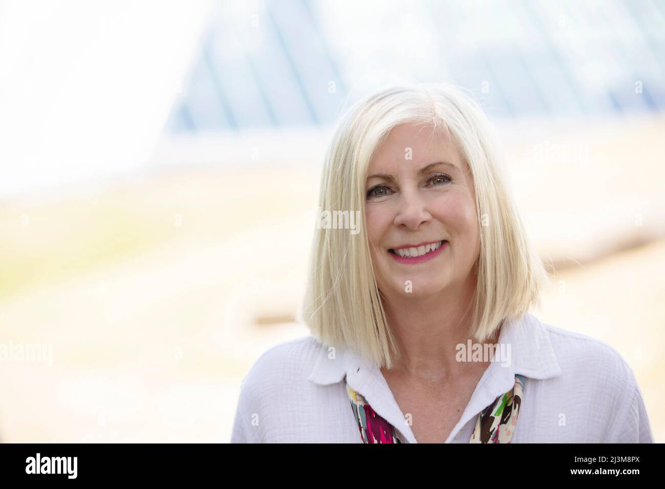 Close-up portrait of a mature woman with white hair; Edmonton, Alberta, Canada Stock Photo