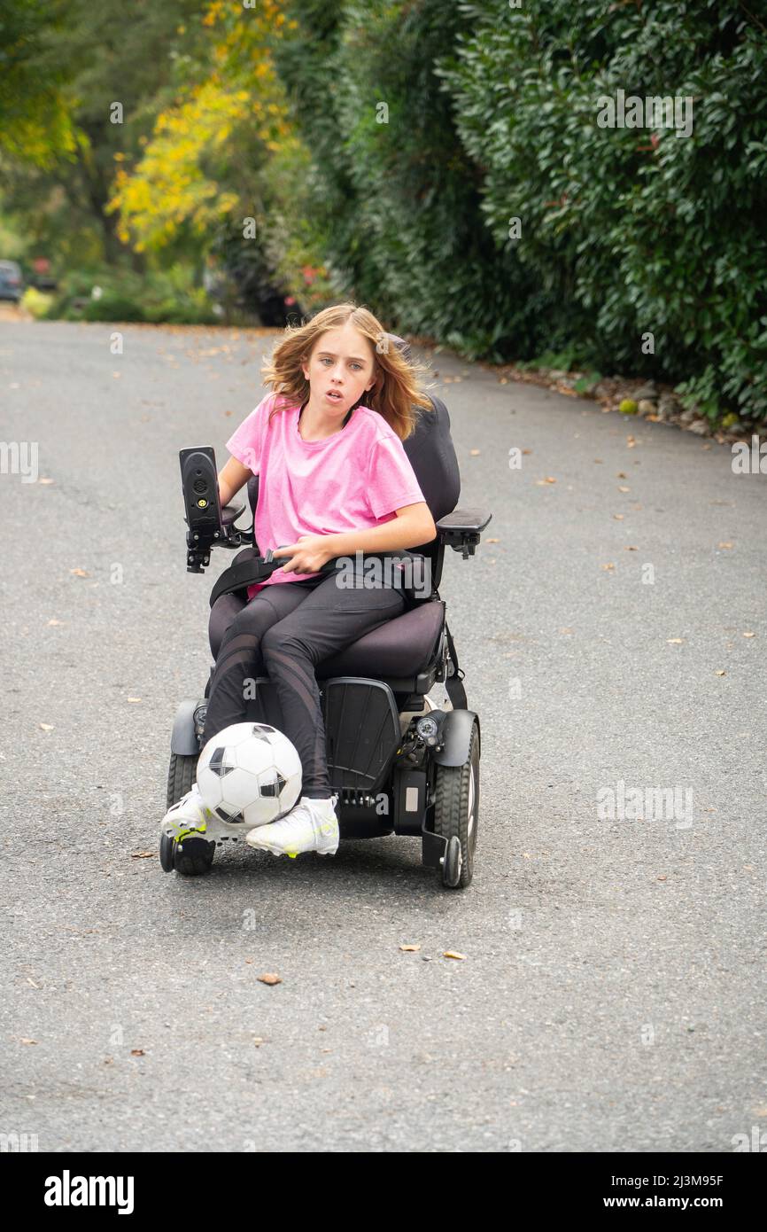 Muscular dystrophy wheelchair child hires stock photography and images