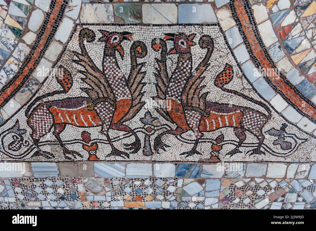 Mosaic floor in decorative patterns and symbols, San Pietro Martire Church on Murano Island; Venice, Veneto, Italy Stock Photo
