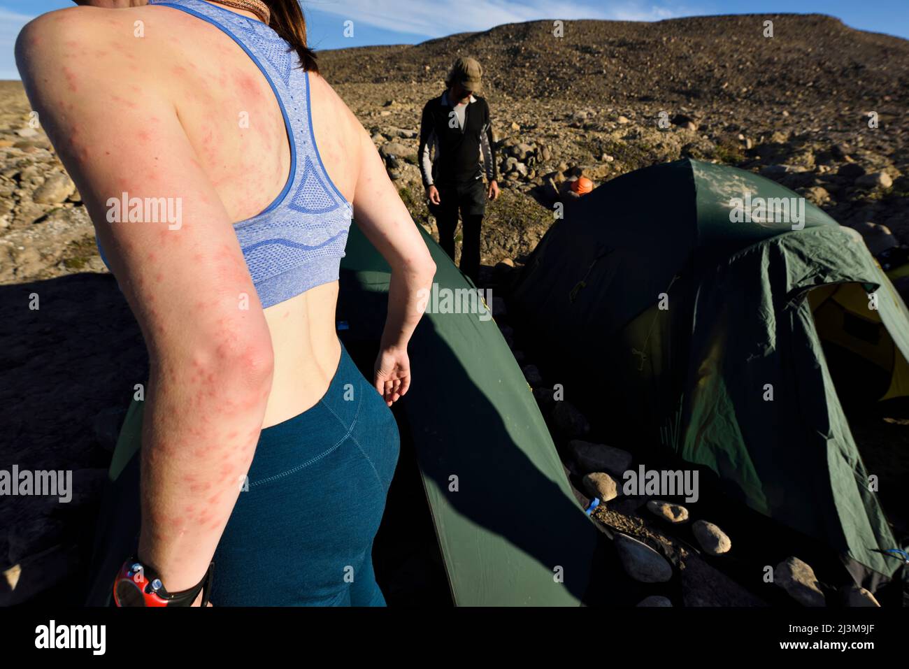 Female Team Member Of A Climate Change Expedition In Greenland Shows 