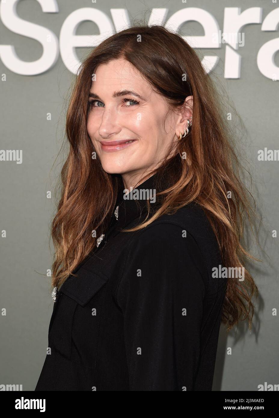 Kathryn Hahn walking on the red carpet at Apple Original Series