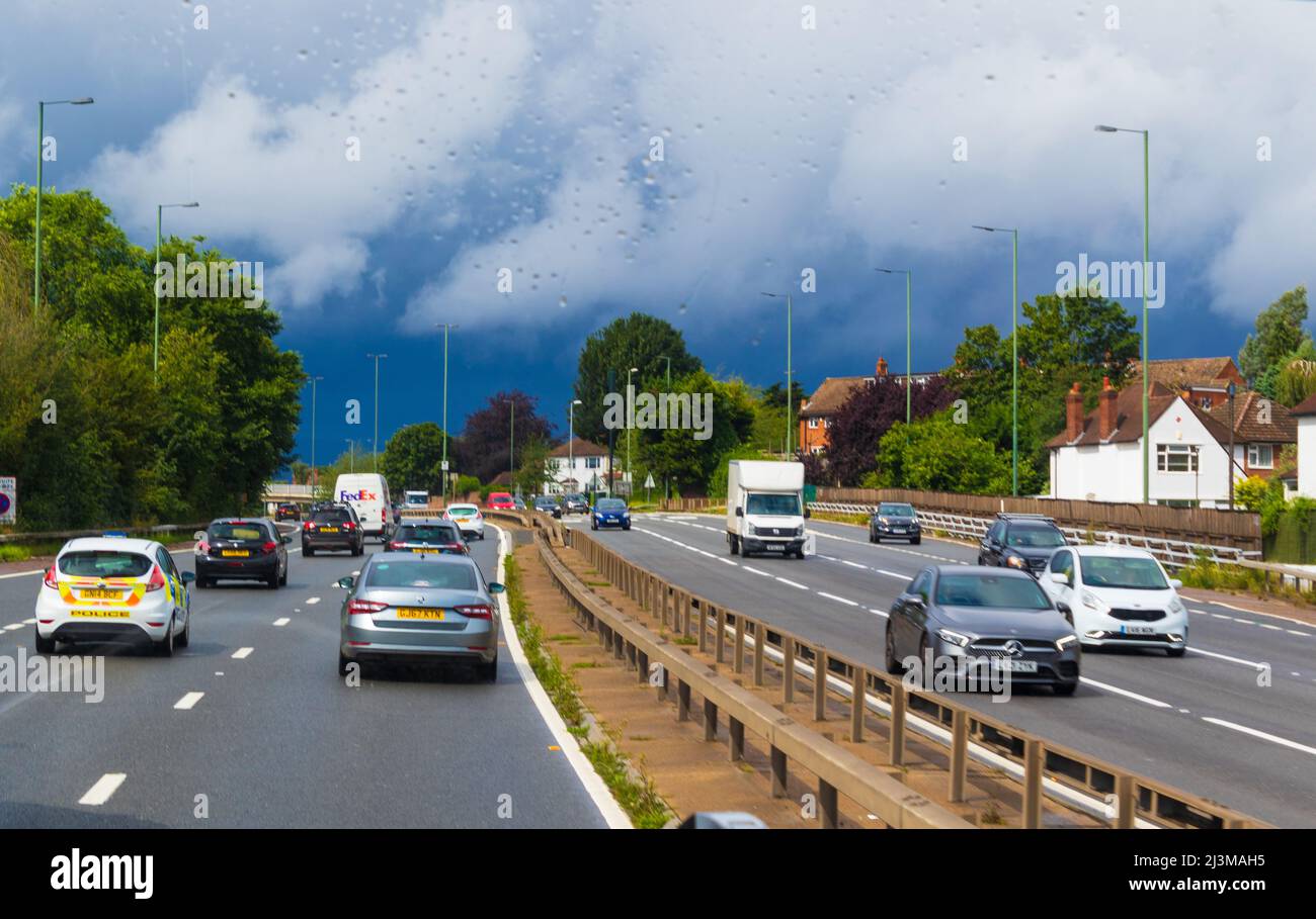 View of A2 road at rainy summer day on London vicinity.The A2 is a major road in south-east England,from London to the English Channel port of Dover Stock Photo