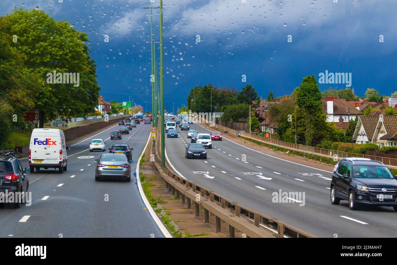 View of A2 road at rainy summer day on London vicinity.The A2 is a major road in south-east England,from London to the English Channel port of Dover Stock Photo