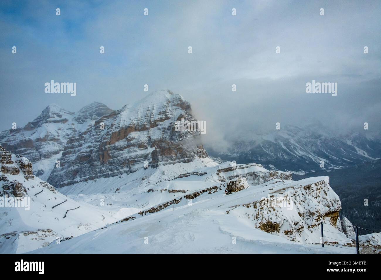 Clouds carrying snow in the italian alps Stock Photo - Alamy