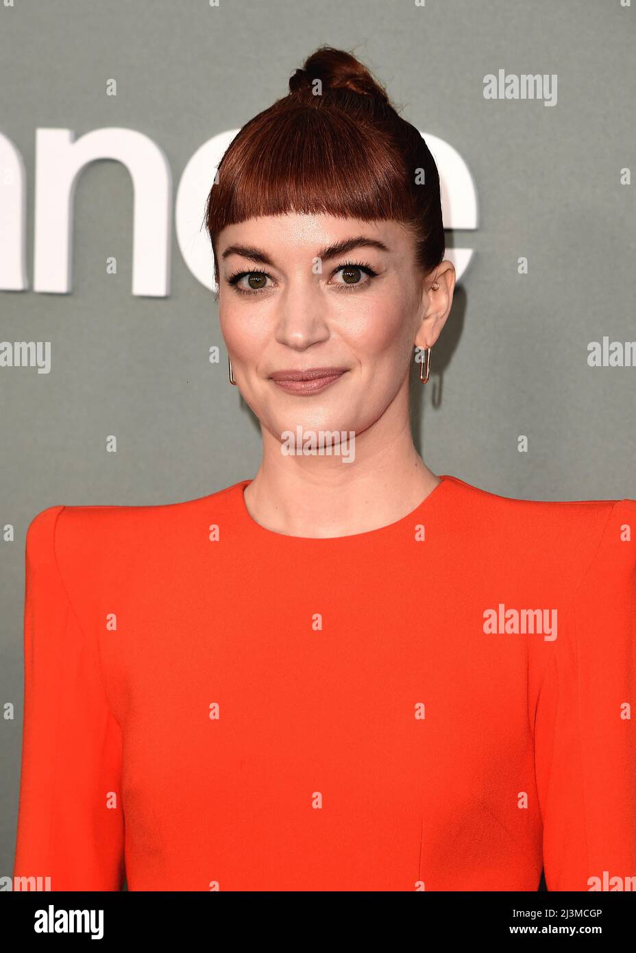 Britt Lower walking on the red carpet at Apple Original Series