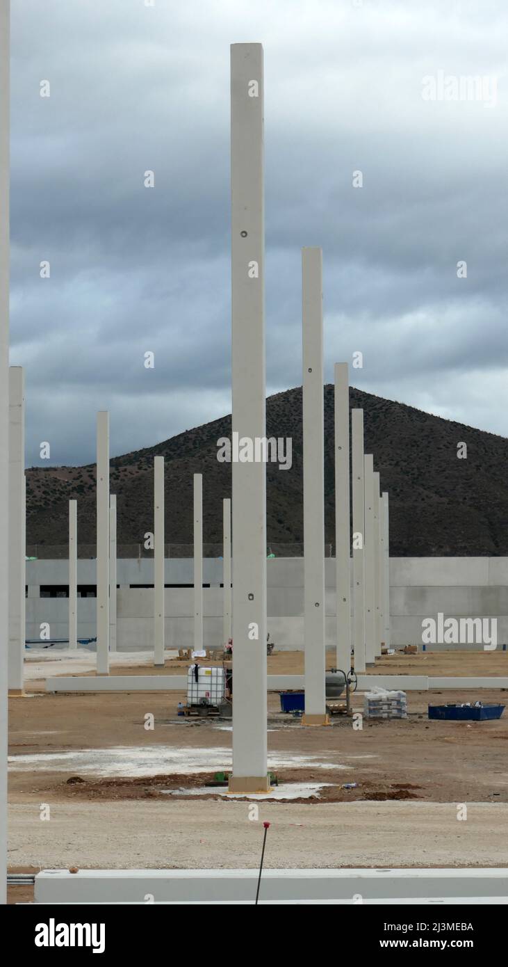 White tall concrete support pillars at new Industrial estate in Southern Andalusia Stock Photo