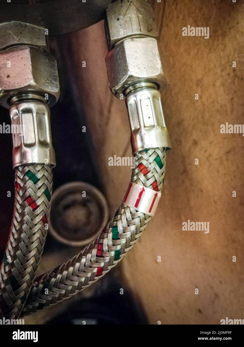 Inlet and outlet of an oil filter of a fuel oil burner in a family