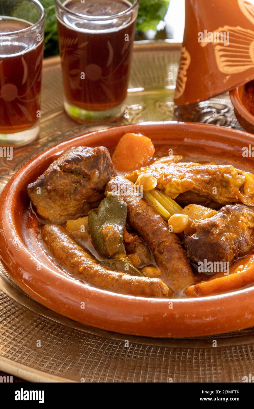 view of a royal couscous composed of chicken, lamb, merguez on a