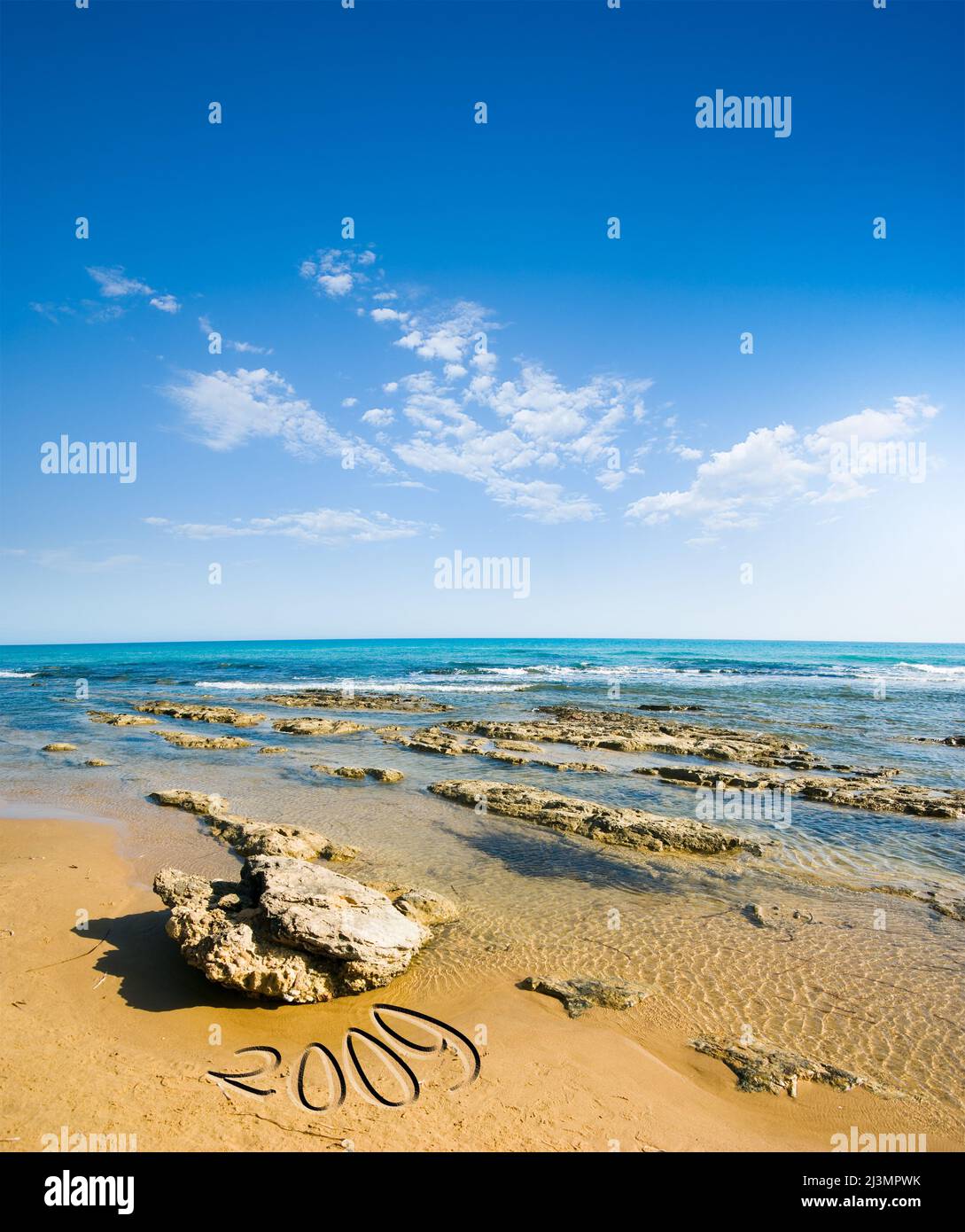 seascape for beach, sea and cloudy sky  (text 2009 Stock Photo