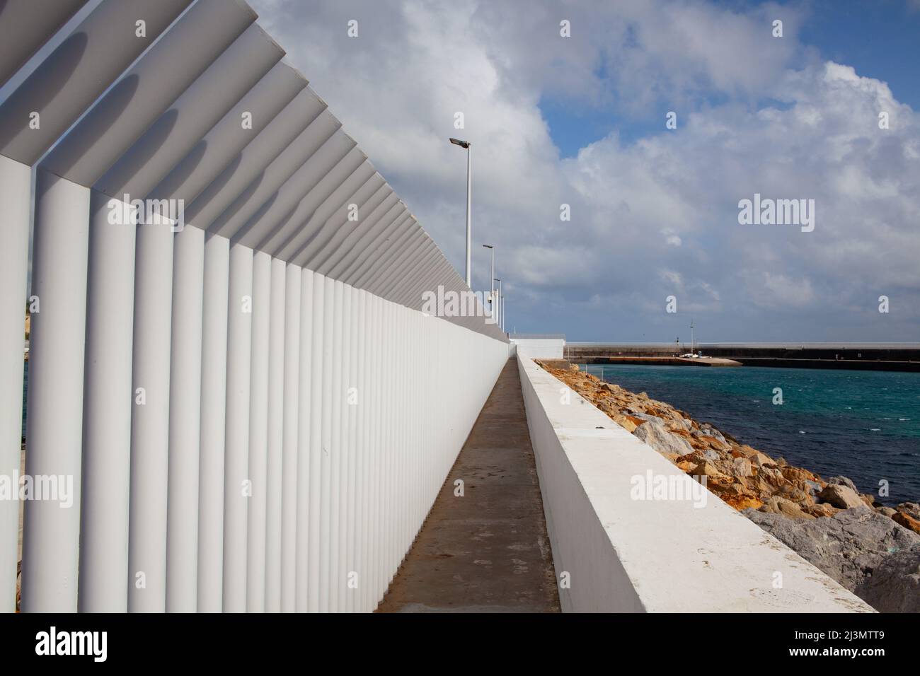 The protective iron fence around the port in Tarifa, Andlalucia, Spain Stock Photo