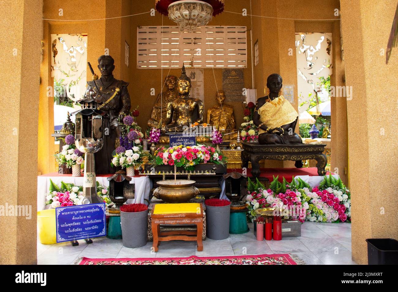 Buddha statue and King Taksin The Great monument for thai people travel visit respect praying blessing holy mystery deity of Wat Sak Yai temple at Ban Stock Photo