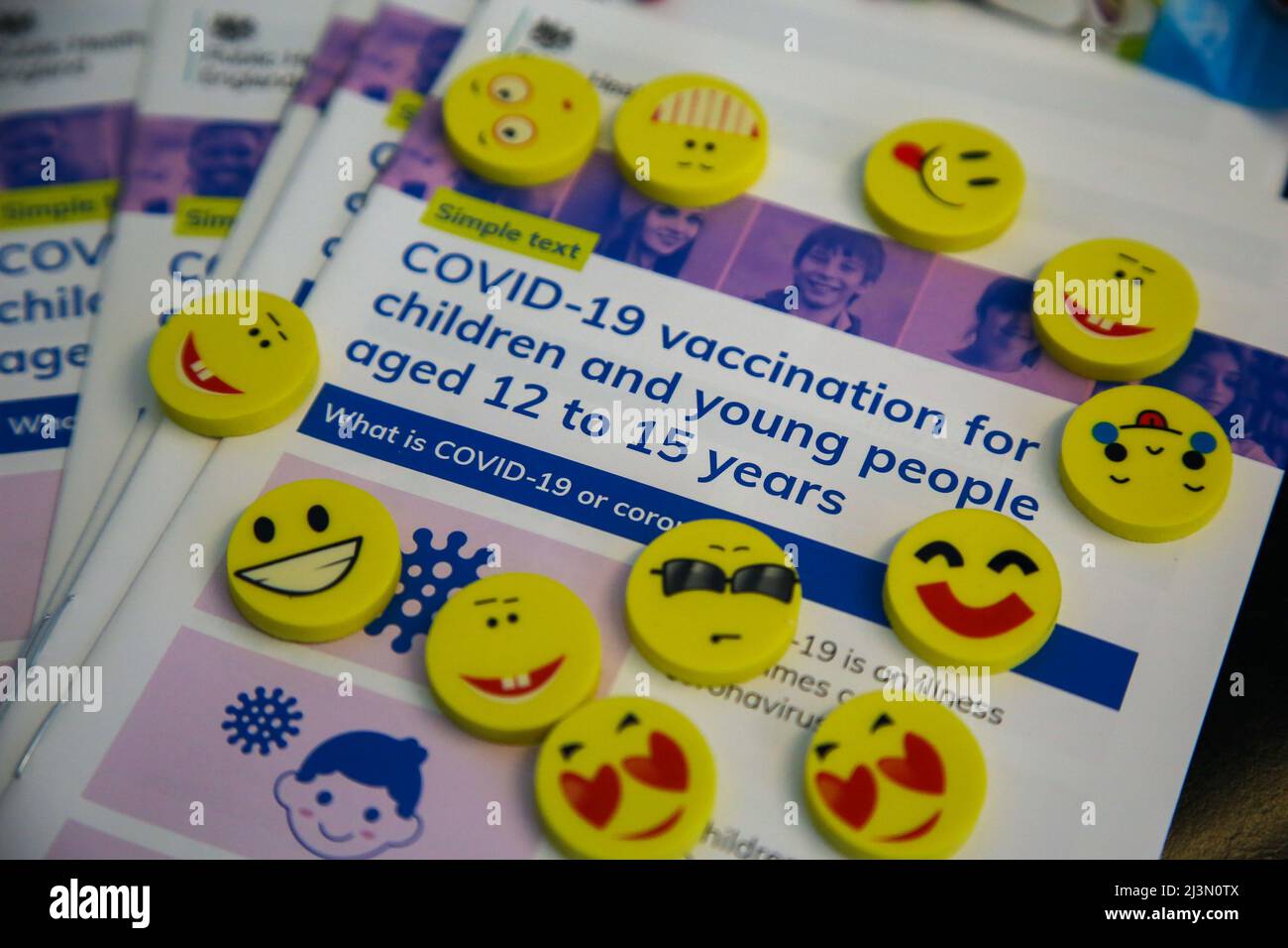 London. UK 8 Apr 2022 - 'COVID-19 vaccination for children and young people aged 12 to 15 years' information leaflet with goodies at a vaccination centre.  Credit Dinendra Haria /Alamy Live News Stock Photo