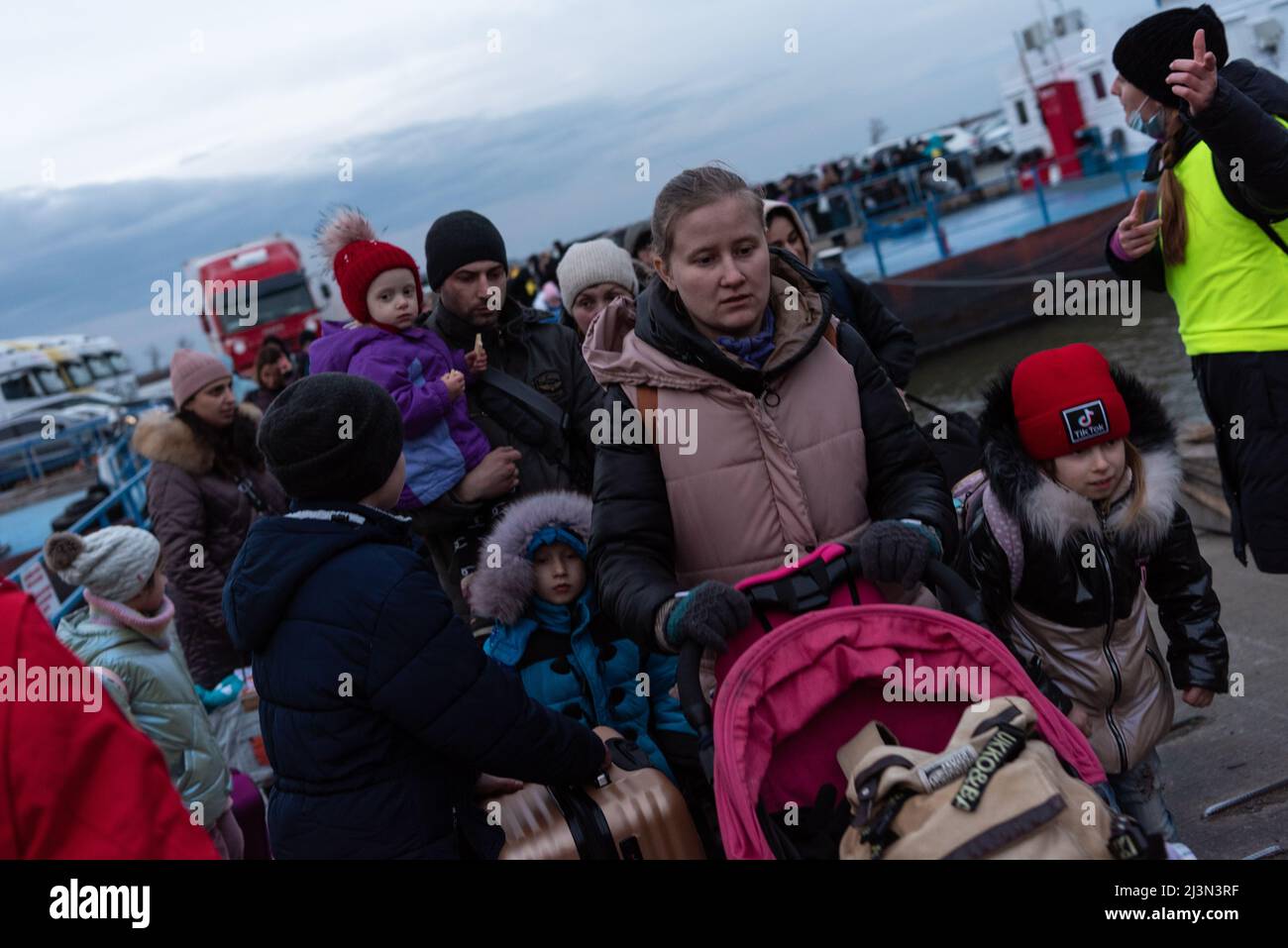 Ukrainian refugees arriving at the border station of Isaccea, Romania, February 27, 2022. Stock Photo