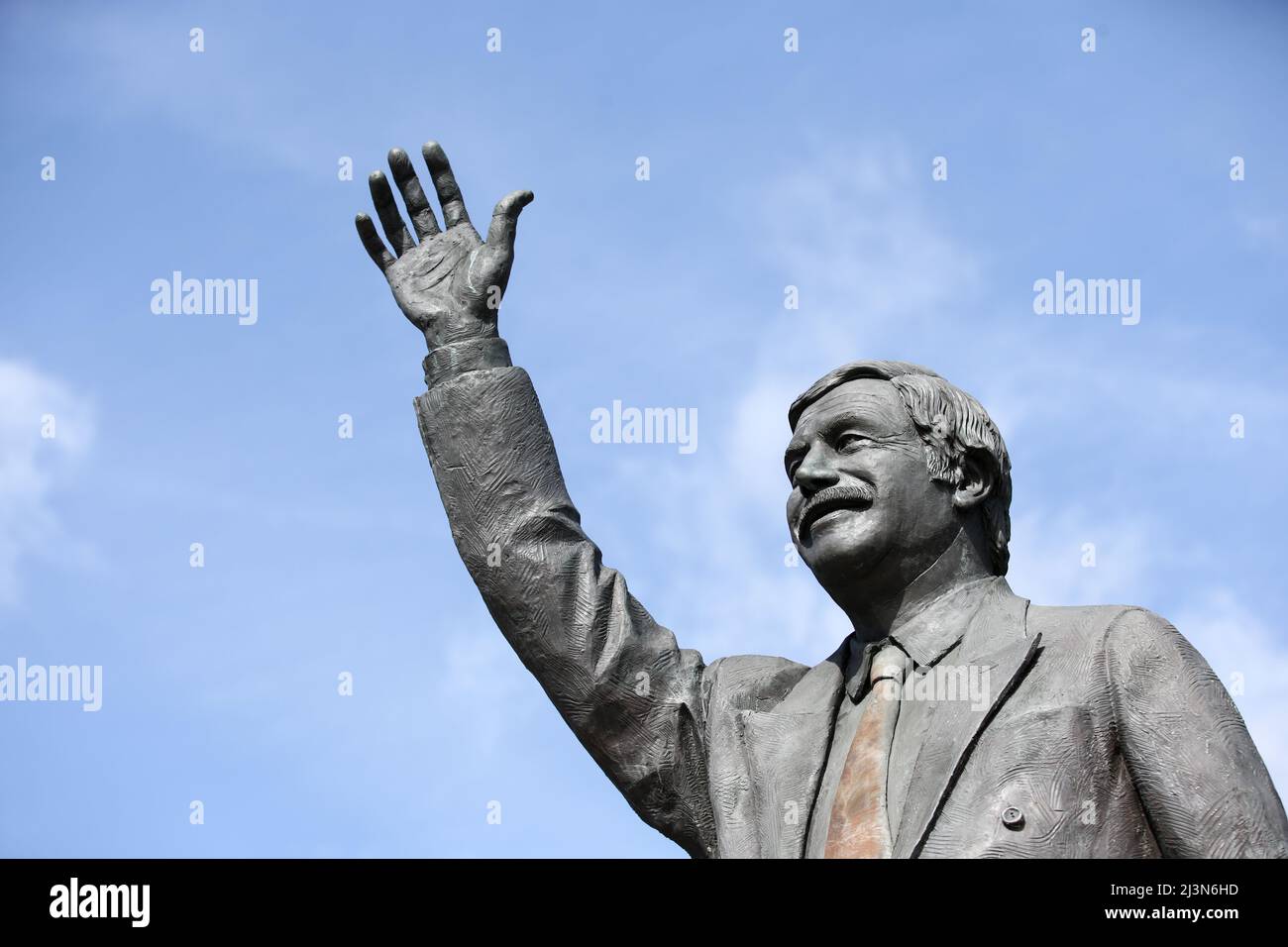 The statue of Derek Dooley MBE outside the stadium Stock Photo