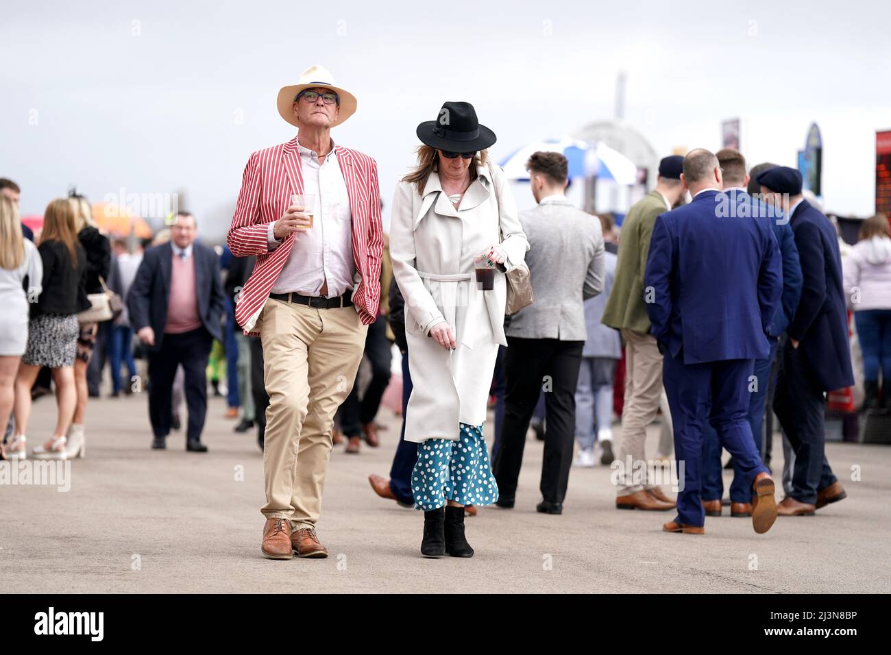 Race goers arrive on Grand National Day of the Randox Health Grand National Festival 2022 at Aintree Racecourse, Liverpool. Picture date: Saturday April 9, 2022. Stock Photo