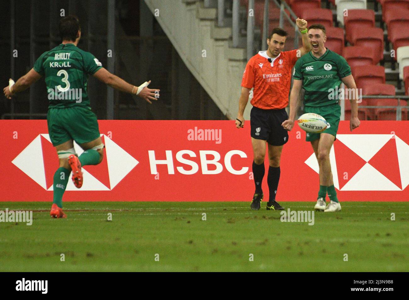 Singapore. 9th Apr, 2022. Terry Kennedy (R) of Ireland reacts on scoring a try during the Pool D match between Ireland and Fiji at the HSBC World Rugby Sevens Singapore stop, held in the National Stadium on April 9, 2022. Credit: Then Chih Wey/Xinhua/Alamy Live News Stock Photo