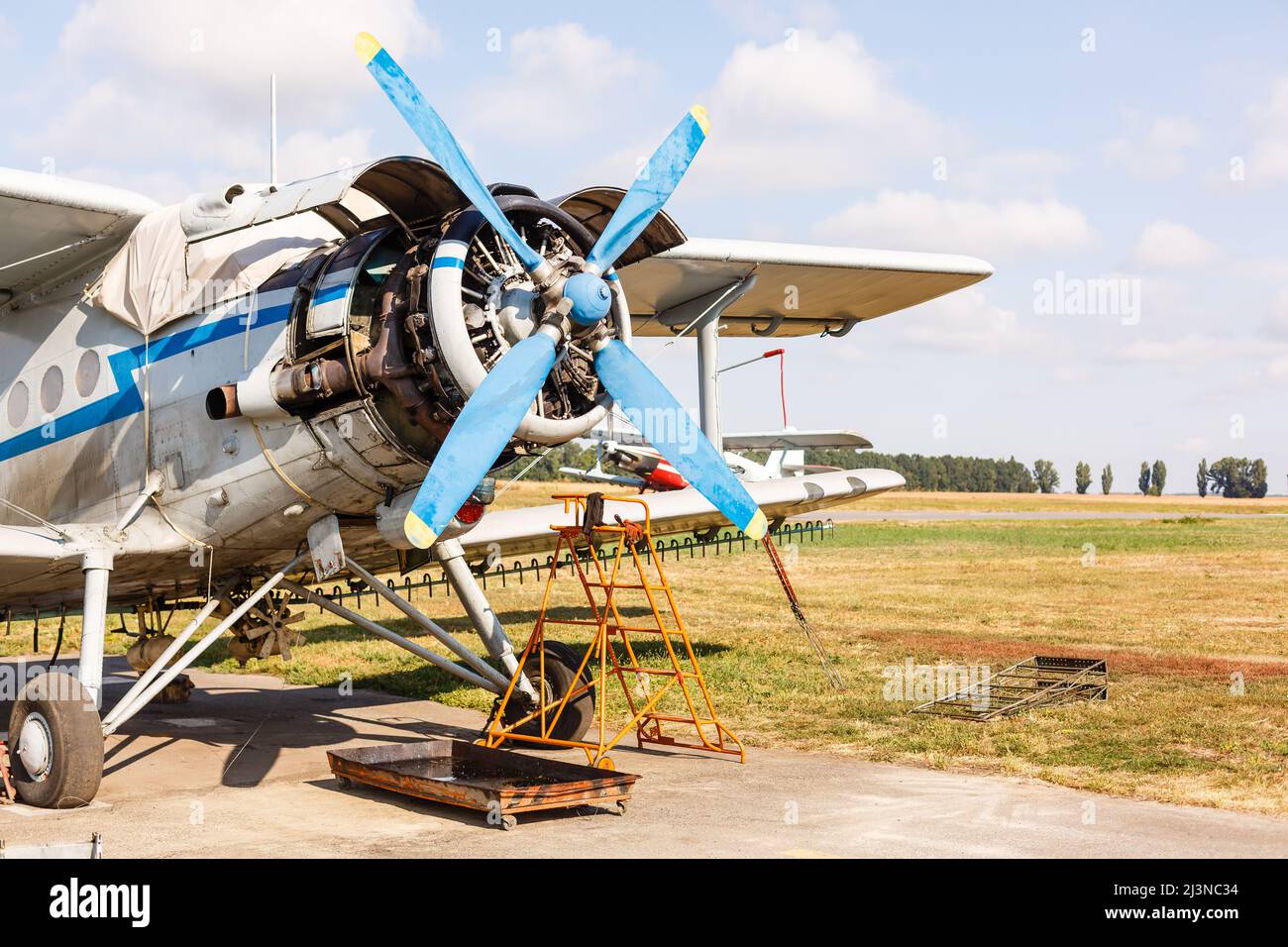 Small aircraft with propeller in parking lot Stock Photo - Alamy