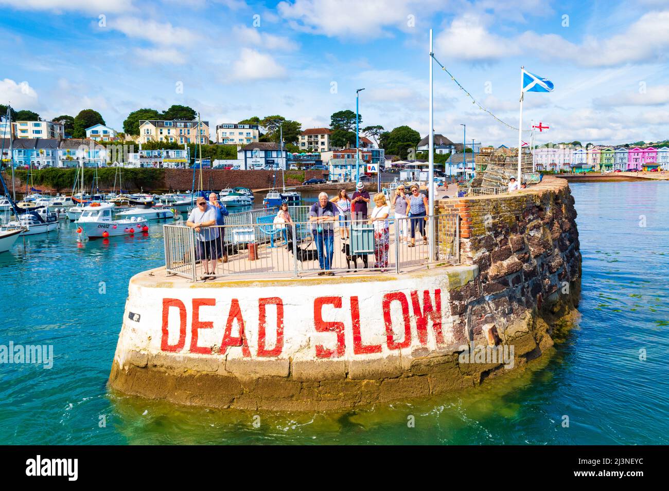 View of Paignton Harbour with boat moorings and restaurants,Devon