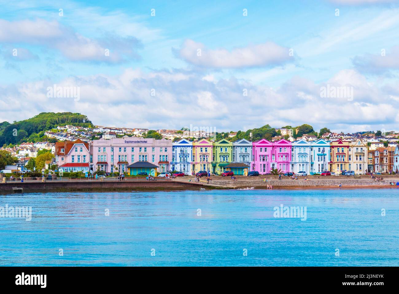View of Paignton town seaside and beach with a long pier juts out from