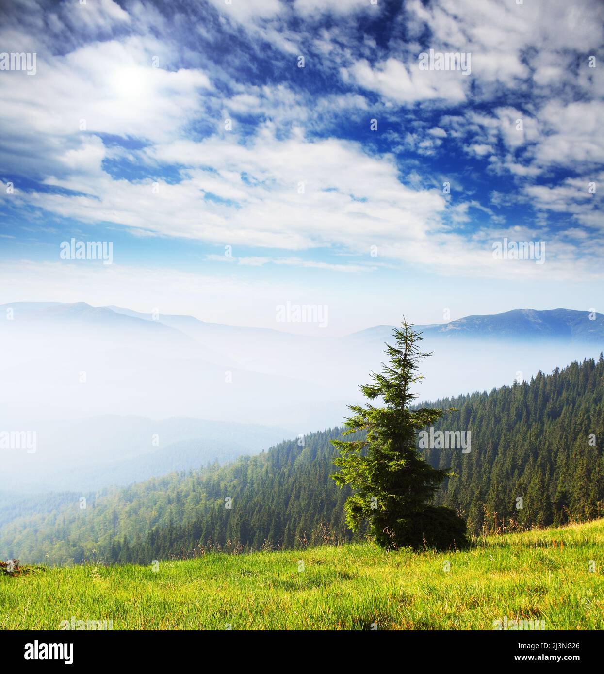 Beautiful mountains landscape and cloudy sky Stock Photo - Alamy