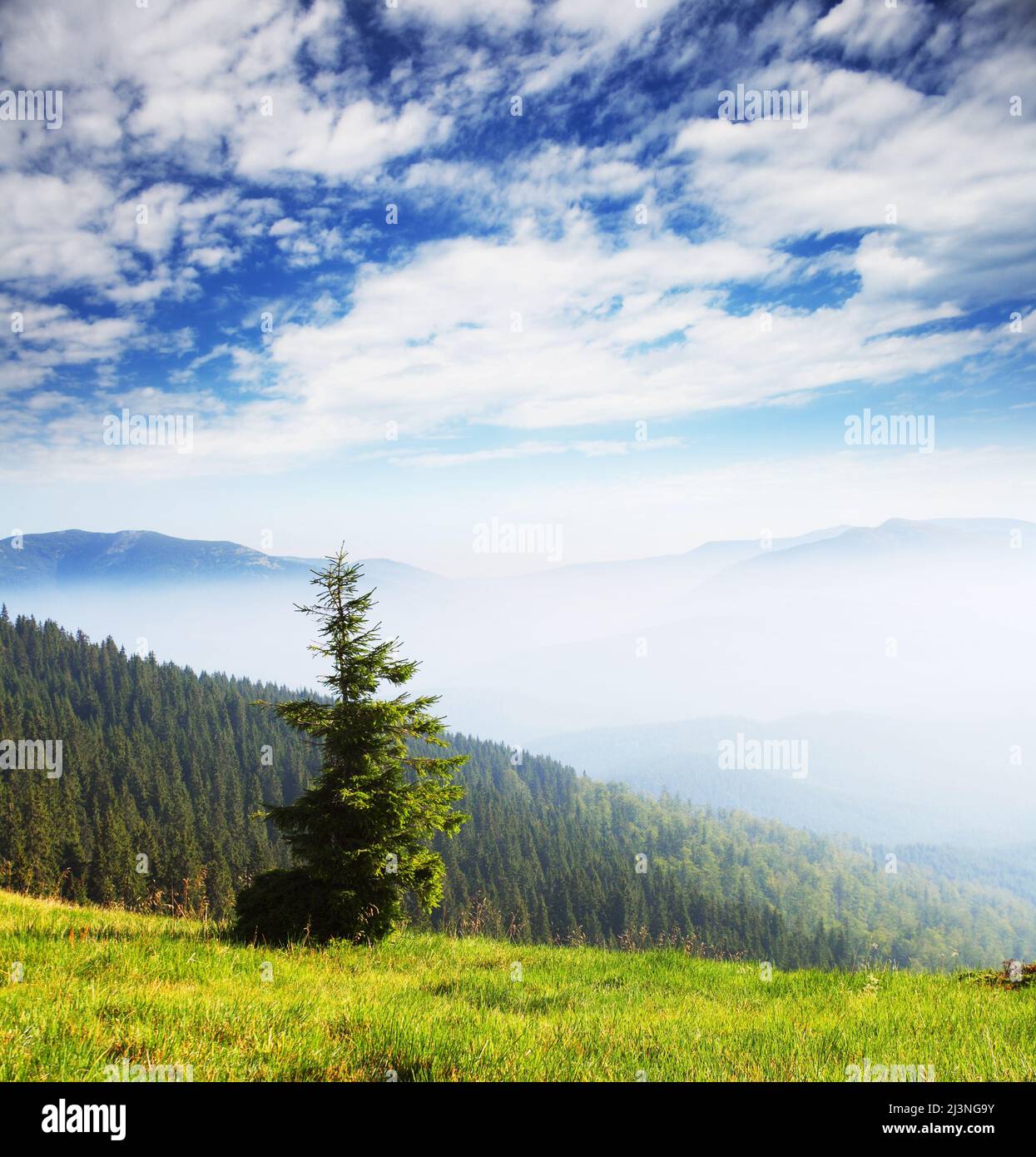 Beautiful mountains landscape and cloudy sky Stock Photo - Alamy
