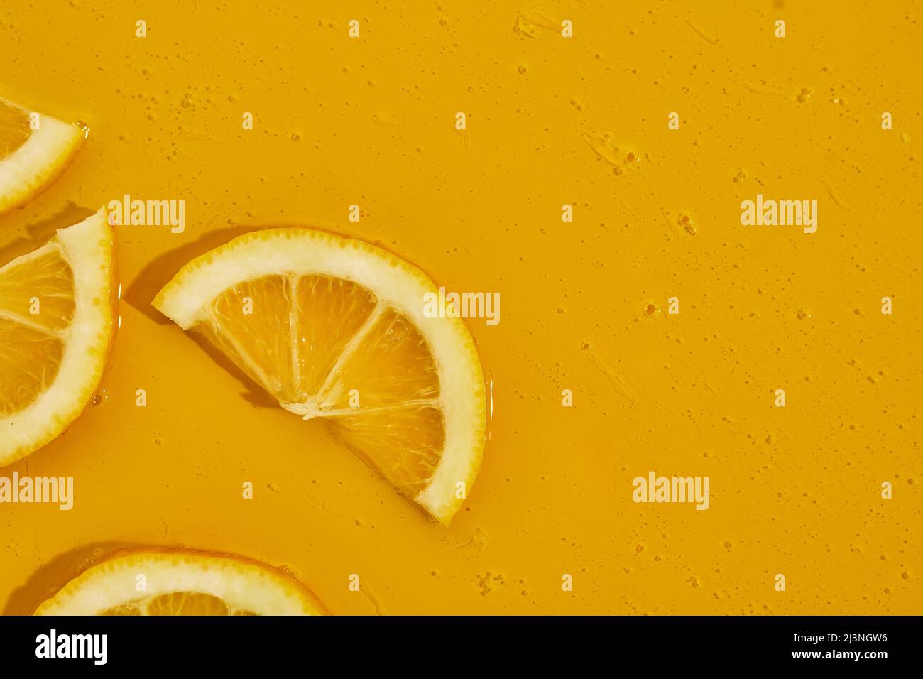 Top view of fresh slice lemons juice and gel serum, organic cosmetics