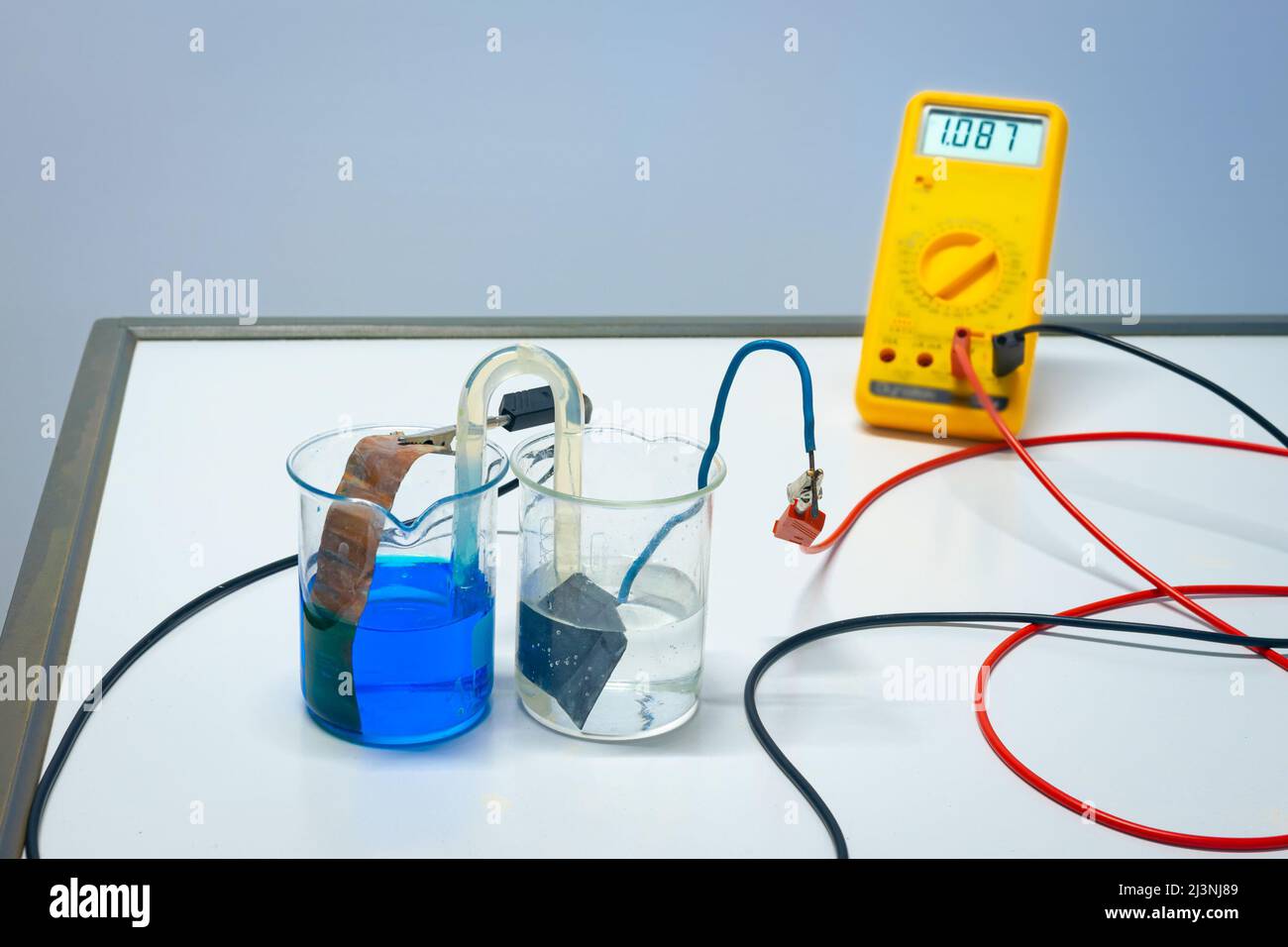 Principle of a rechargeable copper-zinc battery. Used in chemistry class. Stock Photo