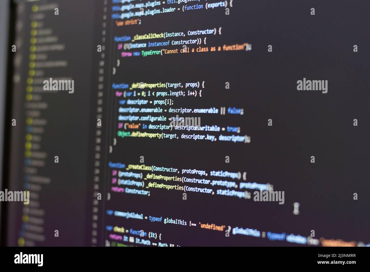Technology development with javascript code on computer screen. Can be used for background Stock Photo