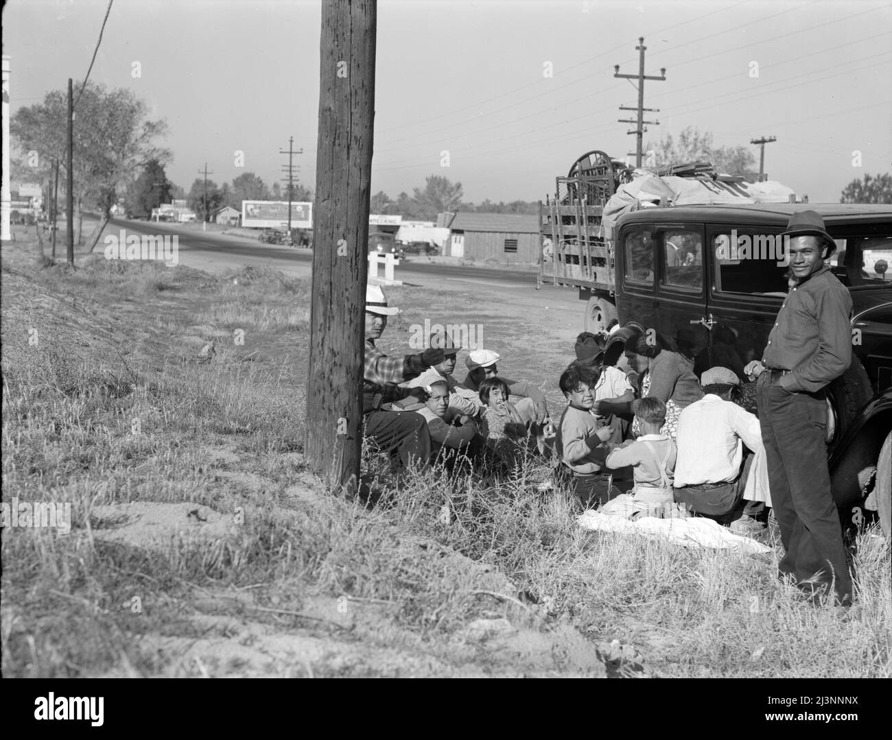 Mexicans bound for the Imperial Valley to harvest peas. Near Bakersfield, California. Stock Photo