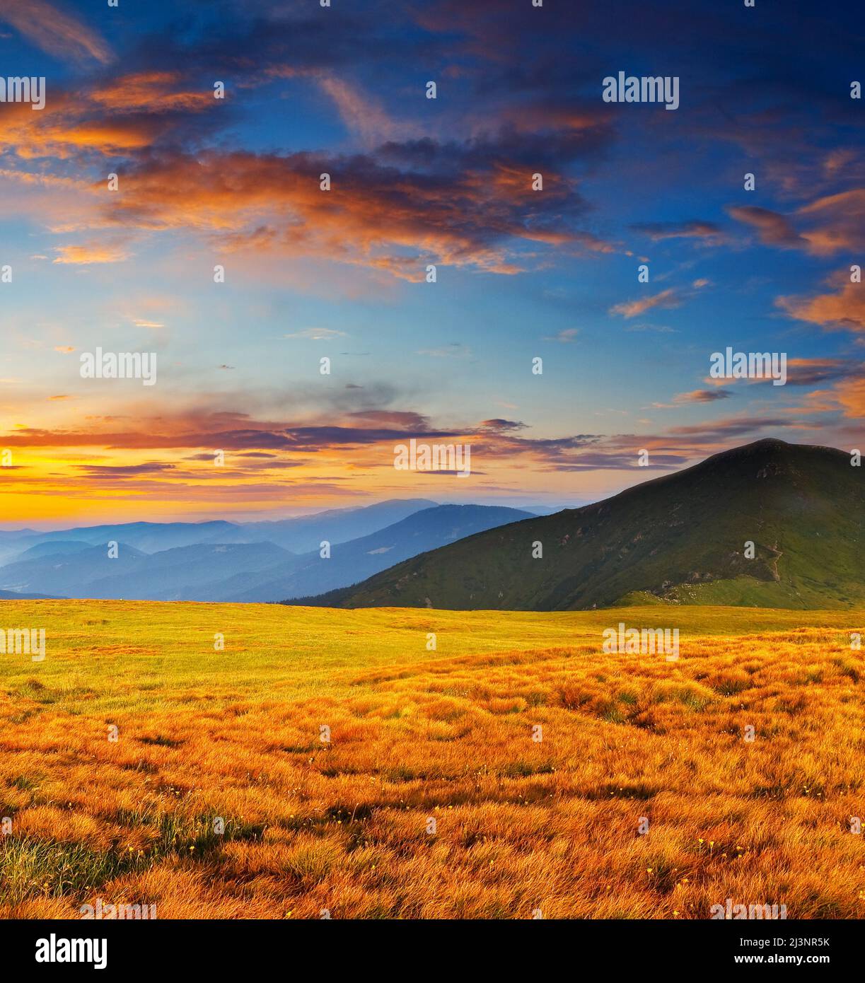 Landscape with mountains under morning sky with clouds Stock Photo - Alamy