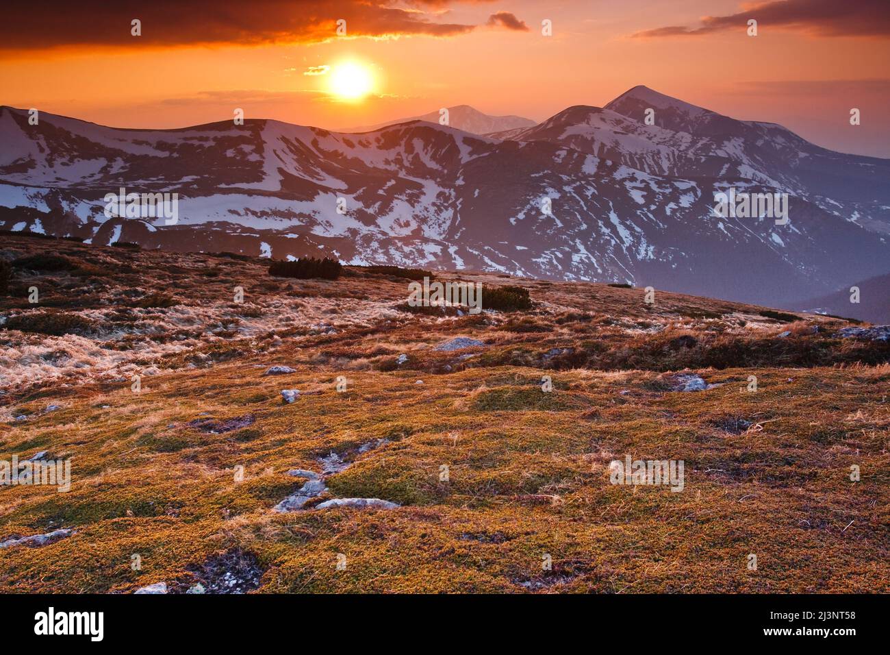 Landscape with mountains under morning sky with clouds Stock Photo - Alamy