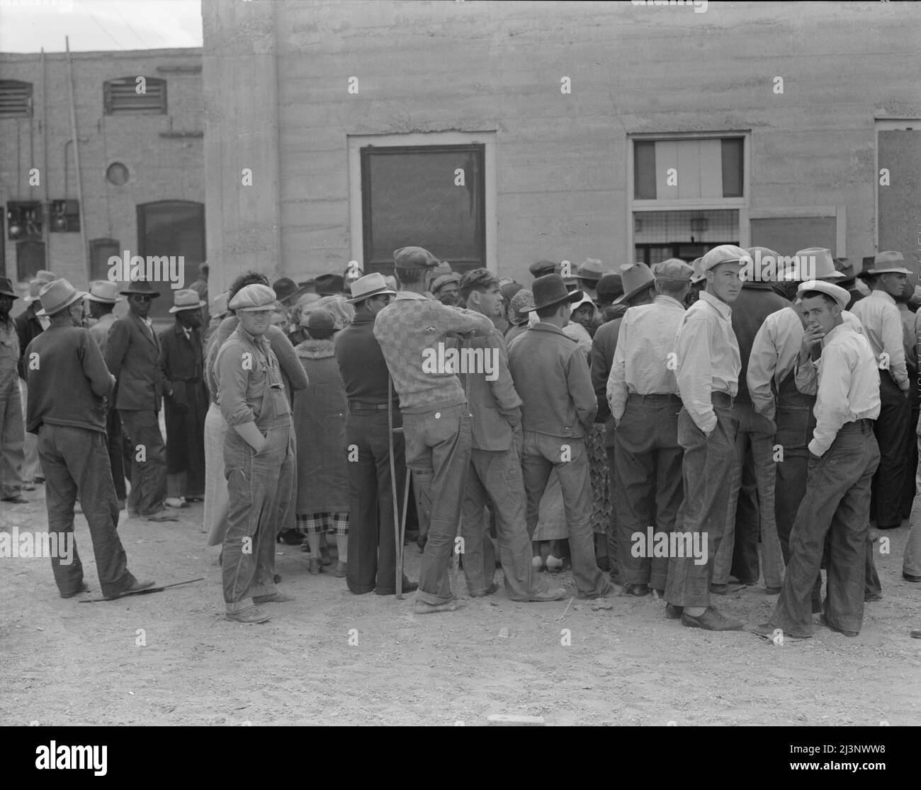 Waiting for the semimonthly relief checks at Calipatria, California